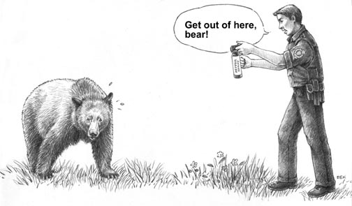 wildlife officer using bear pepper spray and his voice to deter a bear